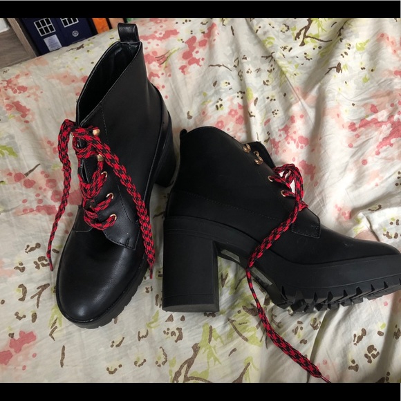 black combat boots with red laces
